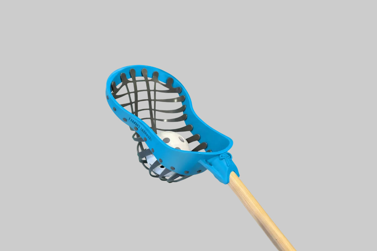Blue lacrosse head with wooden handle on a white background